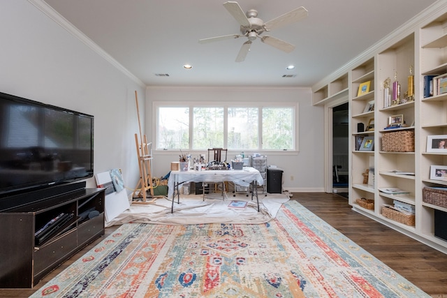 office space featuring dark wood-type flooring, ceiling fan, and ornamental molding