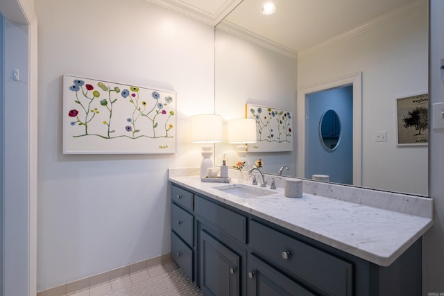 bathroom featuring crown molding, vanity, and tile patterned floors