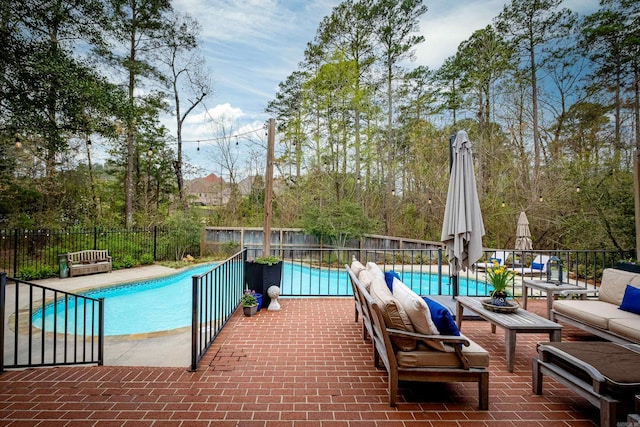 view of pool with a patio