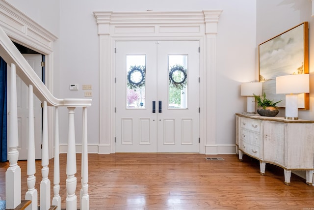 entrance foyer with light hardwood / wood-style floors