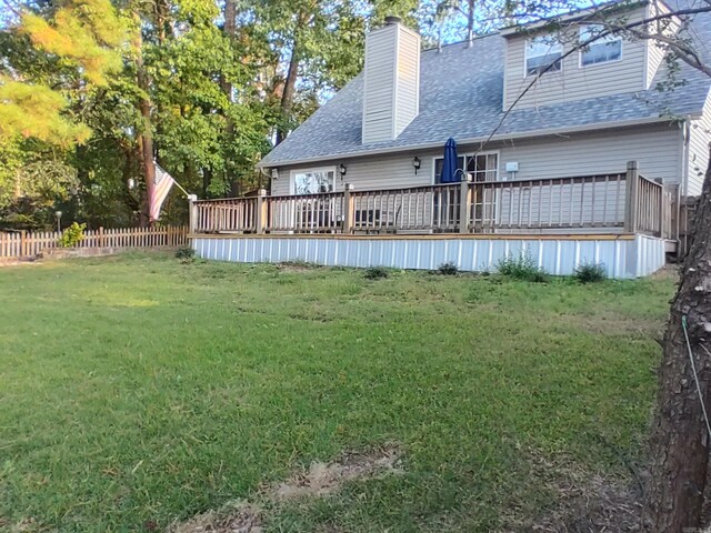 view of yard with a deck