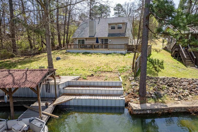 wooden terrace with a water view