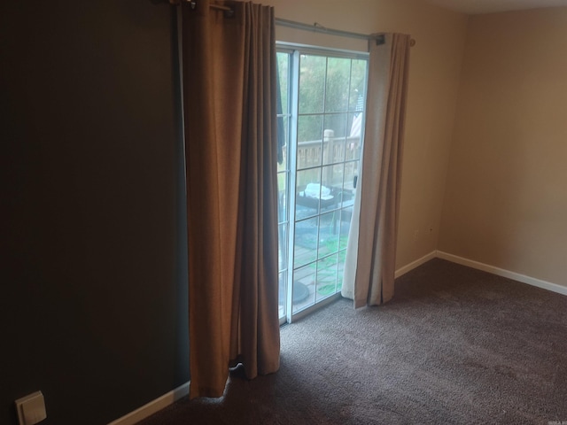 view of carpeted spare room