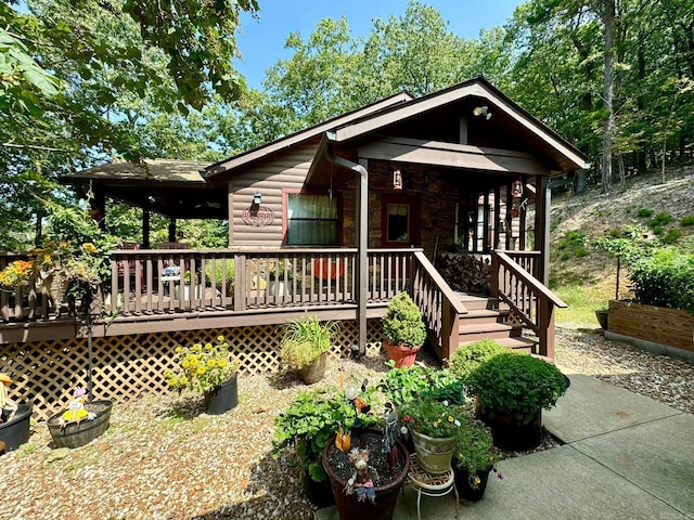 view of front of home with a wooden deck