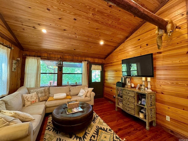 living room featuring lofted ceiling with beams, wooden walls, dark wood-type flooring, and wood ceiling