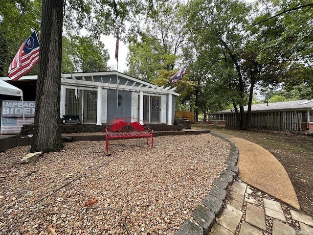 view of yard with a pergola