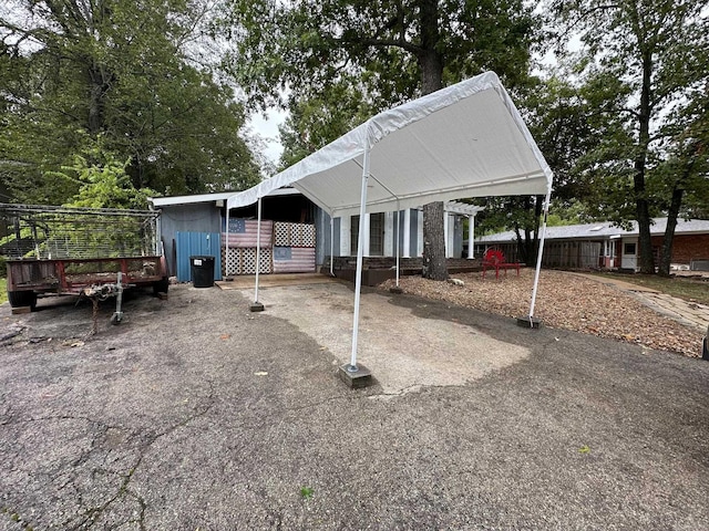 exterior space featuring a carport