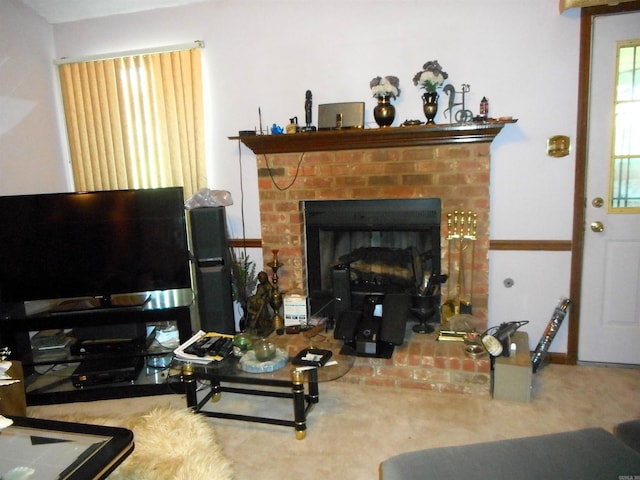 carpeted living room with a fireplace