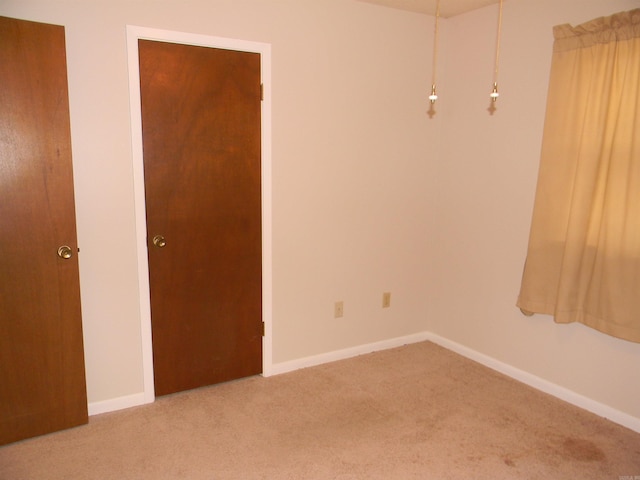 spare room with carpet