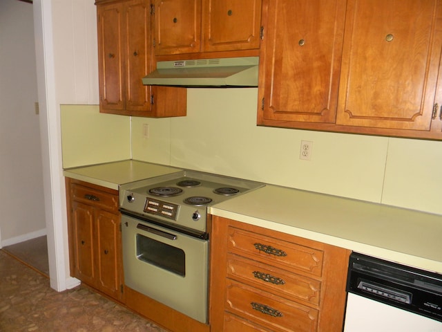 kitchen featuring white dishwasher and electric range