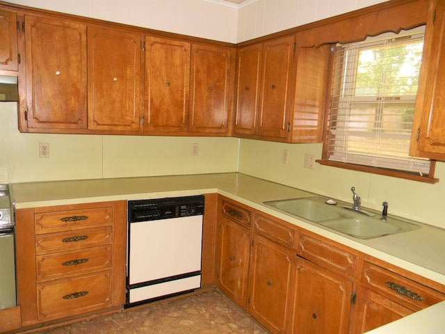 kitchen with white dishwasher and sink