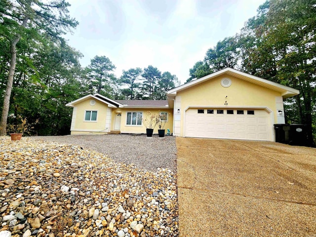 ranch-style home with a garage