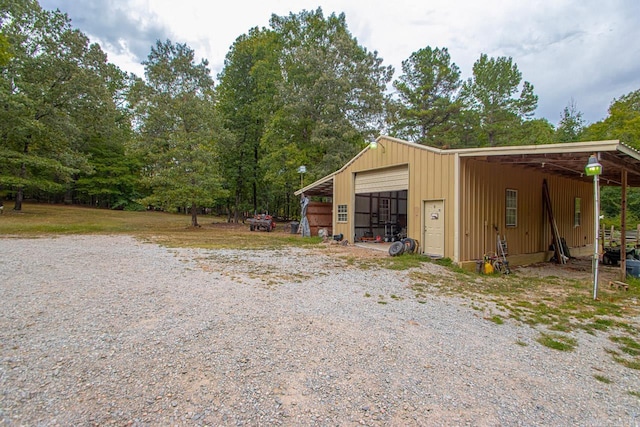 view of outdoor structure with a garage