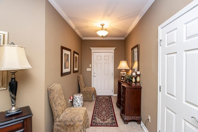 foyer entrance with ornamental molding and light tile patterned floors