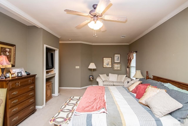 carpeted bedroom featuring ornamental molding and ceiling fan