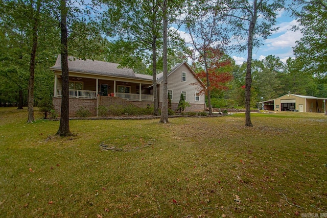 exterior space with a front yard and a porch