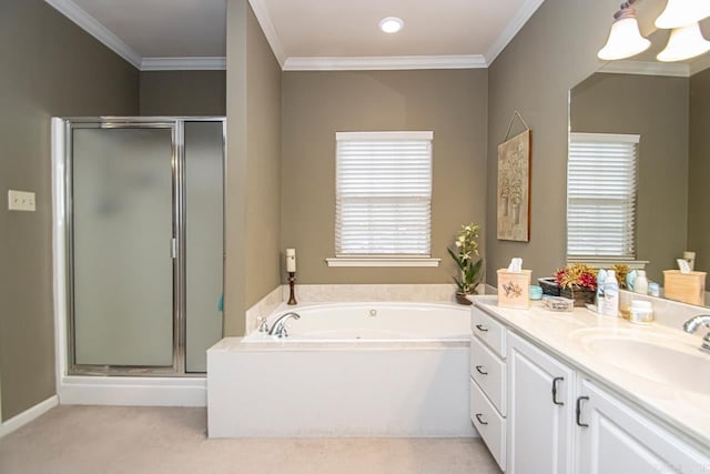 bathroom with vanity, shower with separate bathtub, and ornamental molding