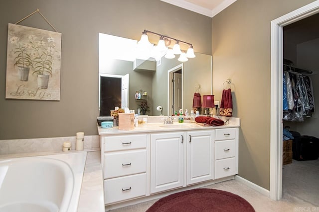 bathroom with a bath, vanity, and crown molding