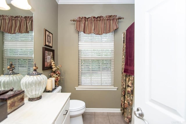 bathroom featuring ornamental molding, tile patterned flooring, vanity, and toilet