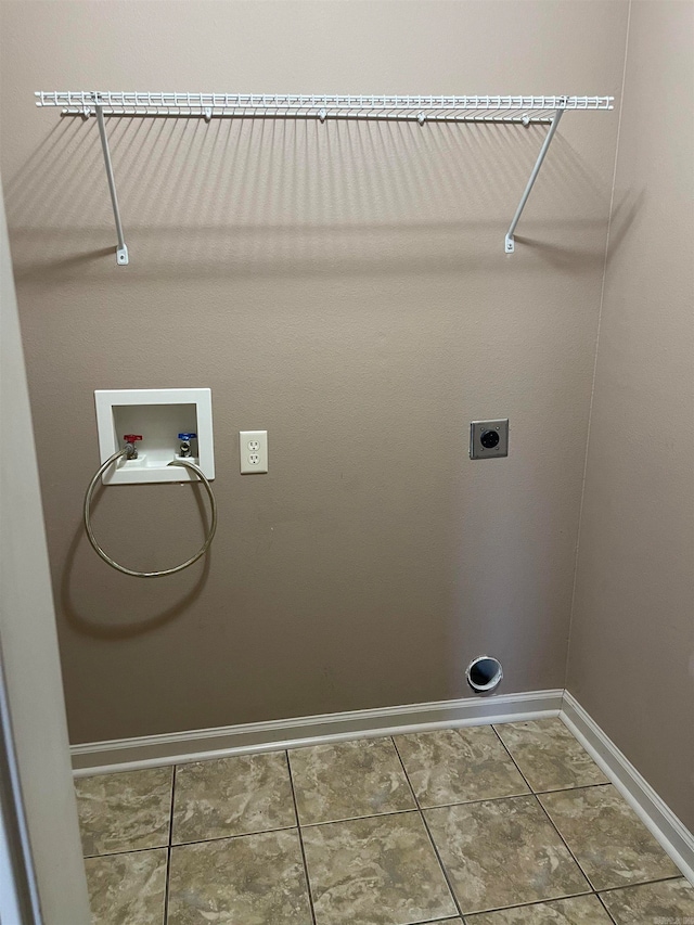 washroom featuring washer hookup, tile patterned floors, and electric dryer hookup