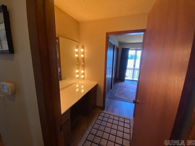 bathroom featuring a textured ceiling