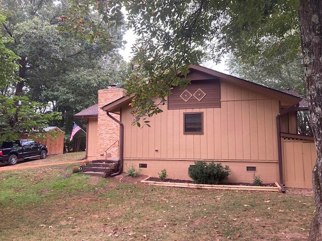 view of property exterior featuring a yard