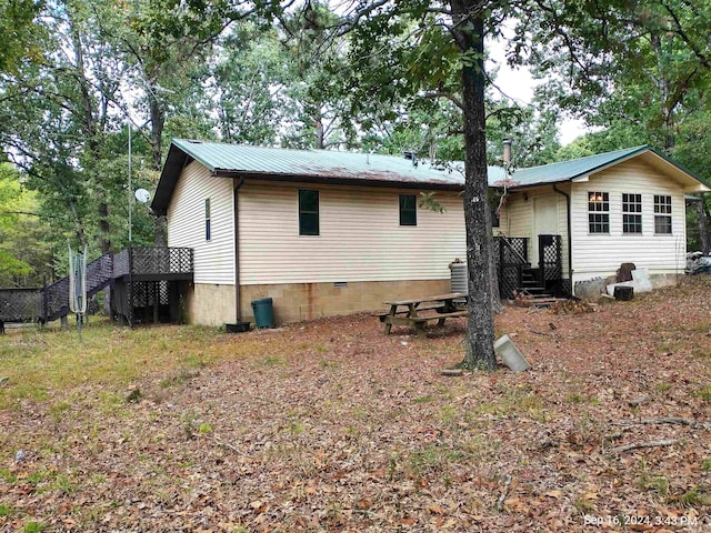 back of property with cooling unit