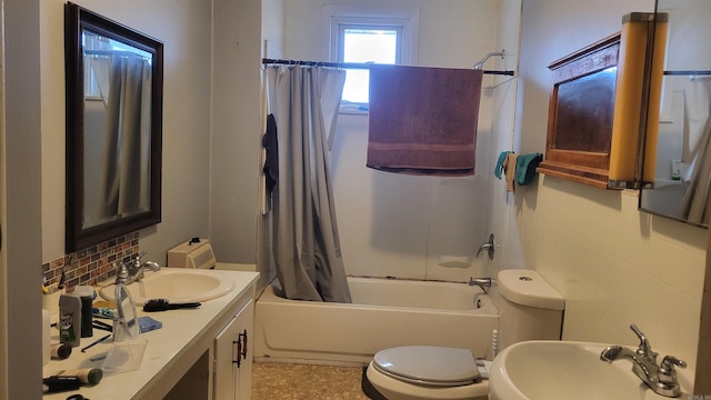 full bathroom with shower / bathtub combination with curtain, toilet, and vanity