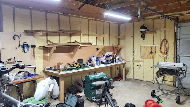 garage featuring a workshop area