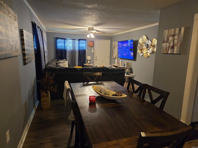 dining area with a textured ceiling, crown molding, hardwood / wood-style floors, and ceiling fan