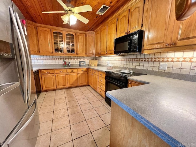 kitchen with backsplash, light tile patterned floors, wooden ceiling, black appliances, and ceiling fan