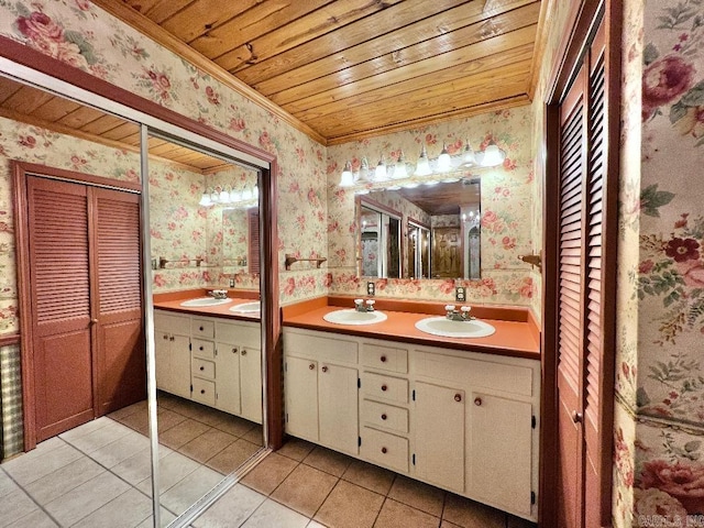 bathroom with wood ceiling, ornamental molding, tile patterned floors, and vanity