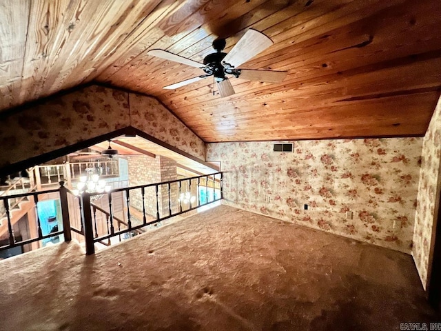 additional living space featuring wood ceiling, lofted ceiling, carpet, and ceiling fan