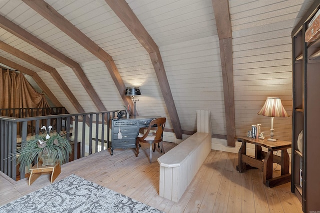 sitting room with wooden ceiling, vaulted ceiling with beams, wood walls, and light hardwood / wood-style flooring