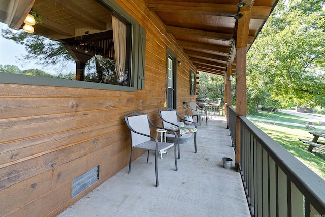 balcony featuring a porch