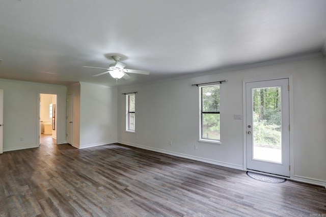 unfurnished room featuring ornamental molding, dark hardwood / wood-style flooring, and ceiling fan