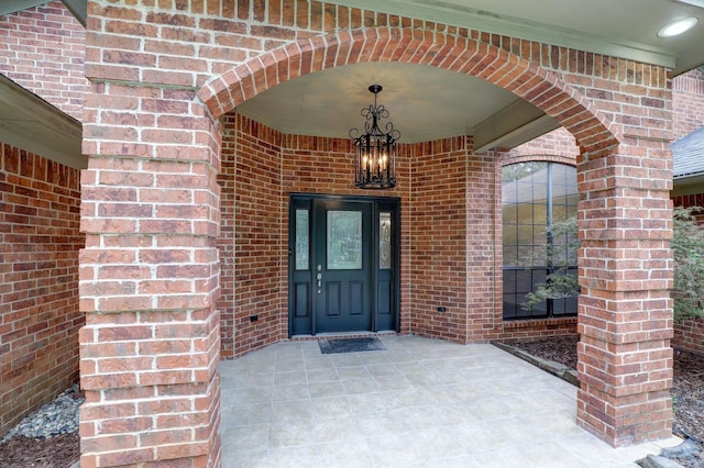 doorway to property featuring covered porch