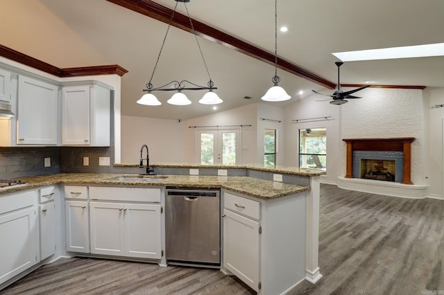 kitchen featuring ceiling fan, appliances with stainless steel finishes, sink, and white cabinetry