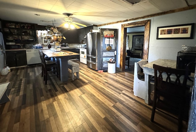 dining room featuring wood-type flooring and ceiling fan