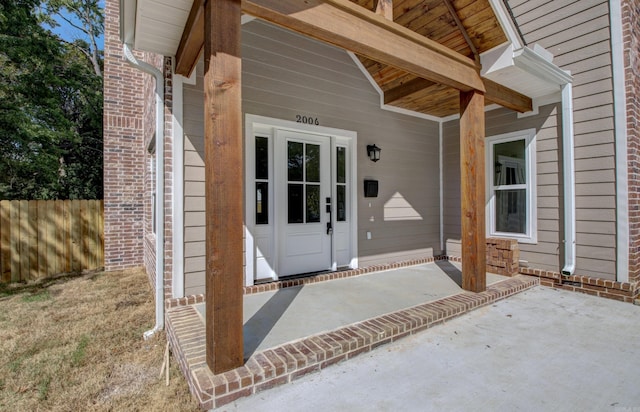 entrance to property with covered porch