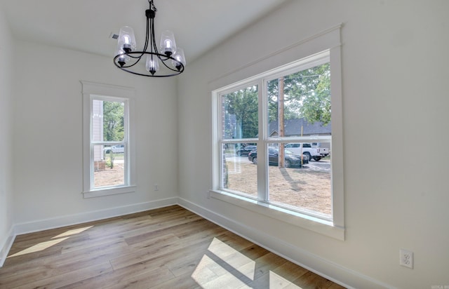 interior space featuring light hardwood / wood-style flooring and a healthy amount of sunlight