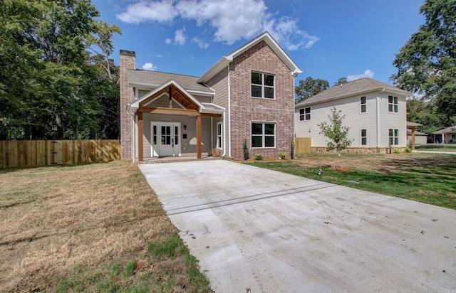 front facade with a front lawn