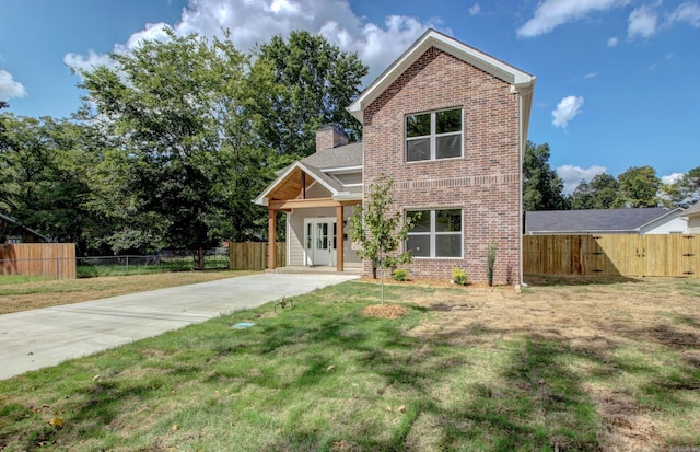 front of property with a front lawn