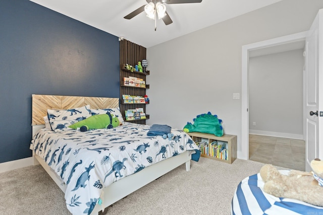 carpeted bedroom with ceiling fan