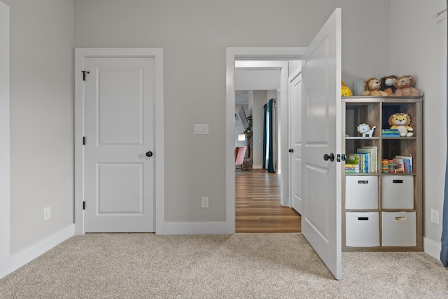 bedroom with hardwood / wood-style floors