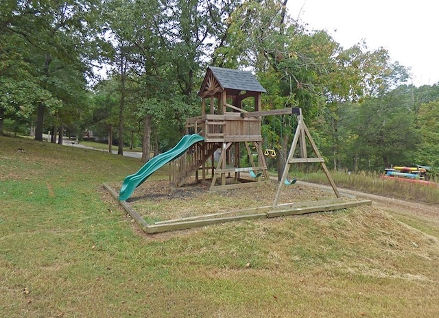 view of jungle gym featuring a yard