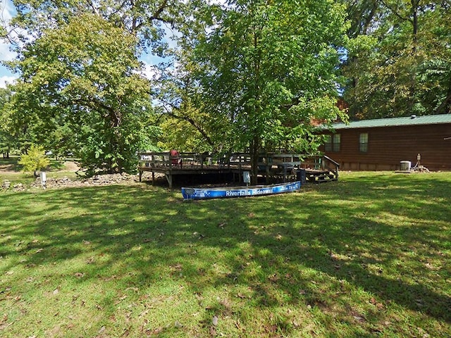 view of yard featuring central AC unit