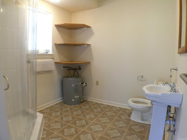 bathroom with electric water heater, a shower, and toilet