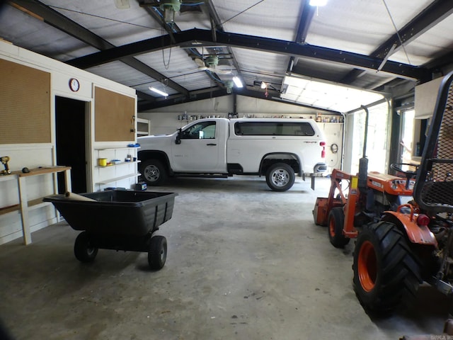 garage featuring a carport