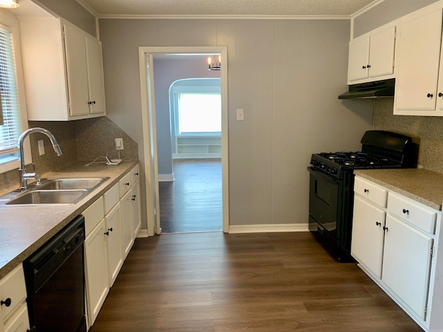 kitchen featuring sink, dark hardwood / wood-style floors, white cabinetry, and black appliances